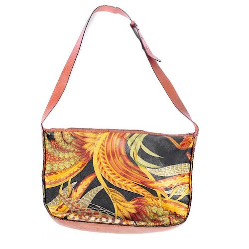 SALVATORE FERRAGAMO - a handbag with interior purse. Designed with a printed jungle motif exterior,