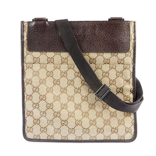 GUCCI - a GG small messenger bag. Featuring a maker's classic GG canvas exterior, brown pebbled leat