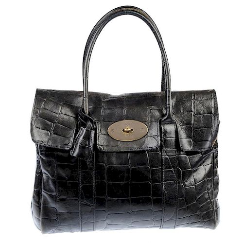 MULBERRY - a Bayswater Bag. Crafted of chocolate Congo leather, featuring double top handles, top fl