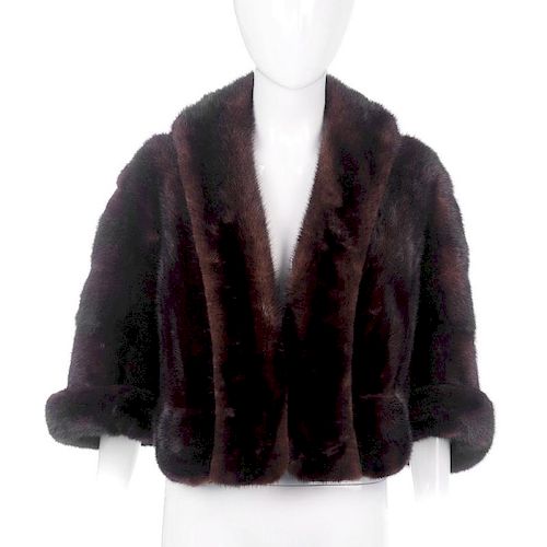 A ranch mink bolero. Designed with an open front, featuring a collar with extended front panels, cro