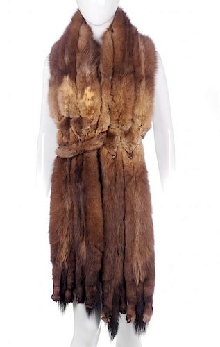 A Russian sable stole. Made up of ten sable skins with tail and paw detail at either end and double