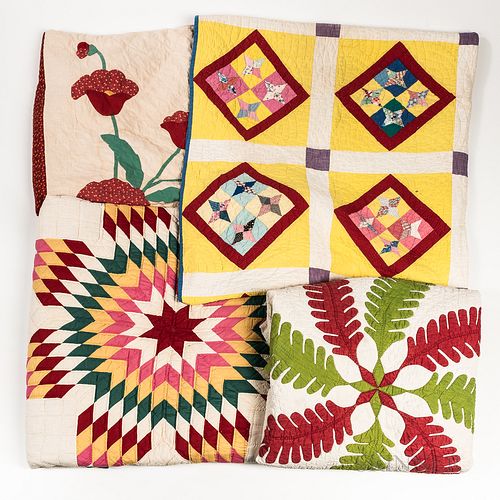 Four Antique or Handmade Quilts