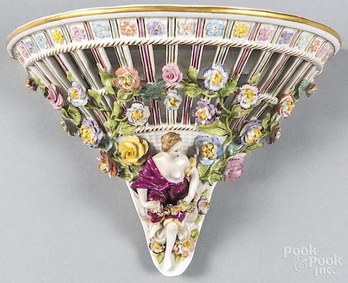 Porcelain wall shelf with a maiden and flowers, 19th c., 8 1/2'' h., 12'' w.