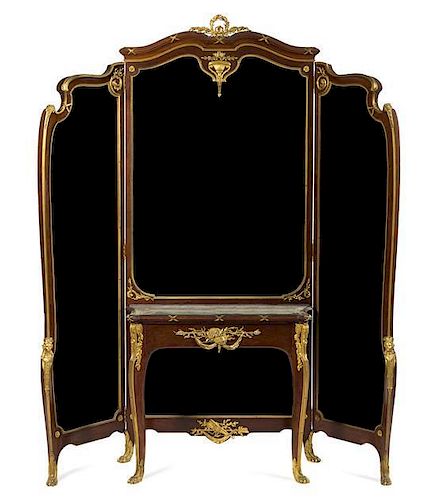 A Louis XV Style Gilt Bronze Mounted Mahogany Dressing Table and Mirror Height 85 x width overall 75 1/2 x depth 15 inches.