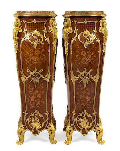 A Pair of Louis XV Style Gilt Bronze Mounted Marquestry Pedestals Height 47 1/2 x width 16 3/8 x depth 16 3/8 inches.