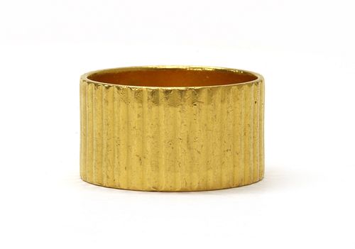 A 22ct gold flat section wedding ring,
