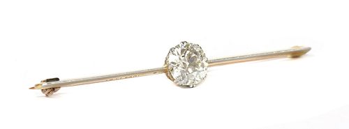 A gold and platinum single stone diamond bar brooch,