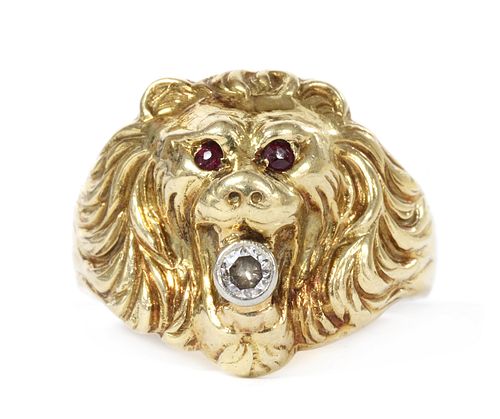 A gold lion head ring,