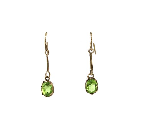 A pair of gold peridot drop earrings,