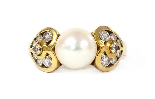 A gold cultured pearl and diamond ring,