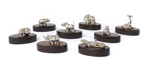 A set of eight silver animal place card holders, by Patrick Mavros,