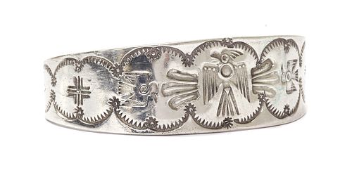 An American Southwest Indian-style silver torque bangle, by Tom DeWitt,