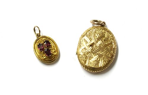 A gold oval locket,