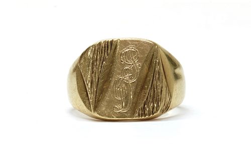 A 9ct gold engraved signet ring,