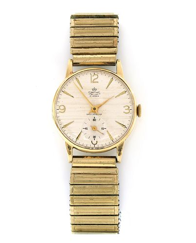 A 9ct gold Smiths 'Deluxe' mechanical bracelet watch,