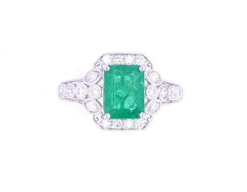Stunning Emerald & VS2 Diamond Platinum Halo Ring