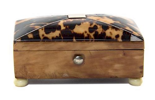 * An English Tortoise Shell Tea Caddy, Height 1 1/4 x width 2 3/4 x depth 1 1/2 inches.