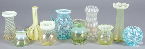Group of opalescent vaseline and blue glass vases