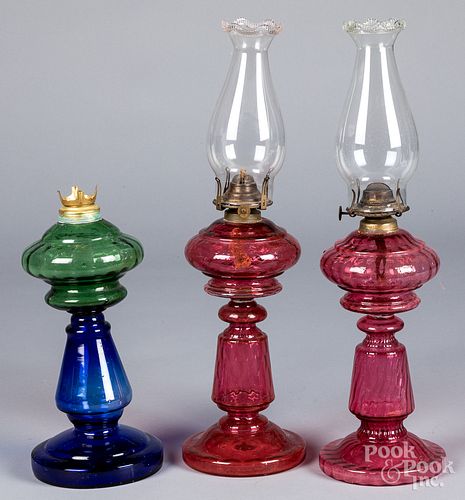 Three colored glass fluid lamps