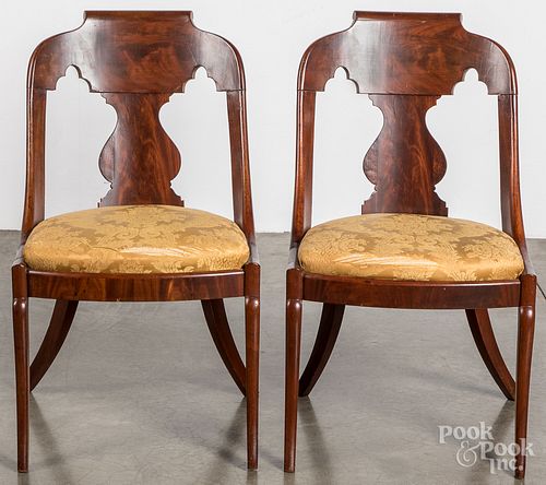Pair of mahogany sabre leg dining chairs