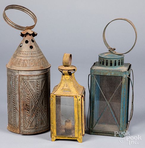 Three tin lanterns