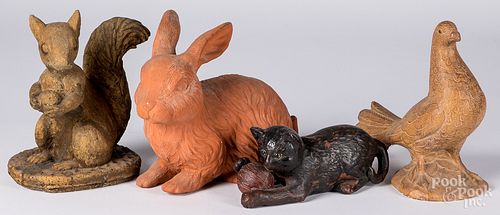 Four pottery and composition animals