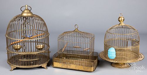 Three brass bird cages, 20th c.