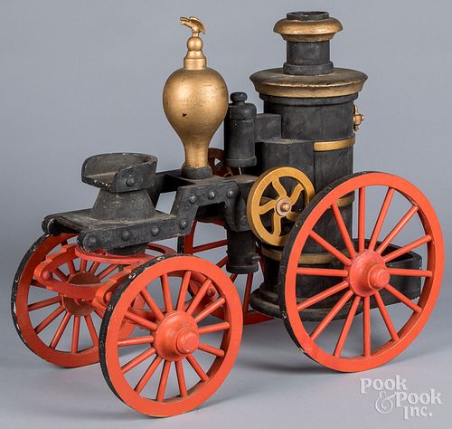 Early painted wood model of a fire pumper