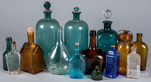 Collection of glass bottles, jars, and flasks
