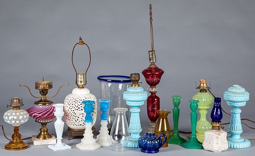 Group of fluid and table lamps and candlesticks