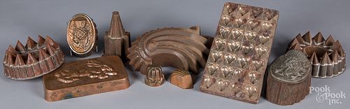 Group of tin and copper food molds