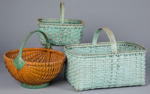 Three painted splint baskets