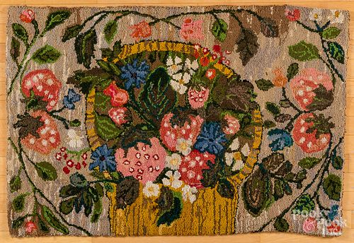 Floral and strawberry hooked rug, 20th c.