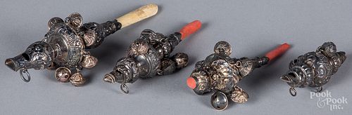 Four Victorian baby rattles/whistles
