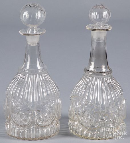 Two blown colorless glass decanters, 19th c.