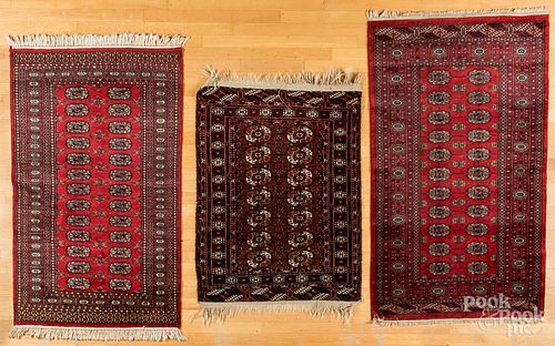 Three Bohkara carpets, largest - 5'7" x 3'2".