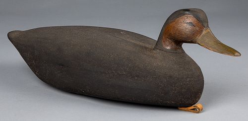 Carved and painted black duck decoy, mid 20th c.