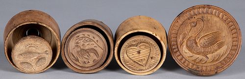 Four carved butter prints, 19th and 20th c.