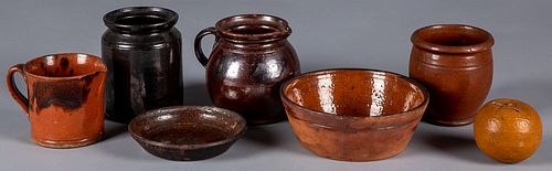 Seven pieces of Pennsylvania redware, 19th c.