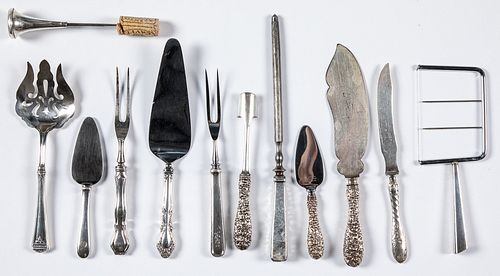 Sterling silver handled serving utensils.