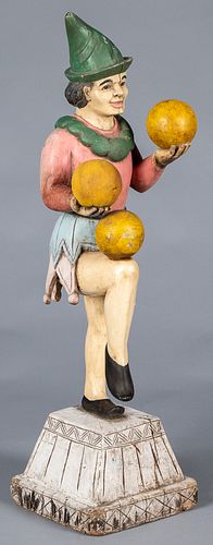 Carved and painted jester juggler counter figure