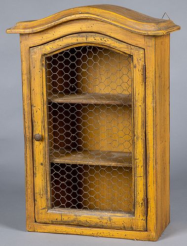 Painted pine hanging cupboard, 20th c.