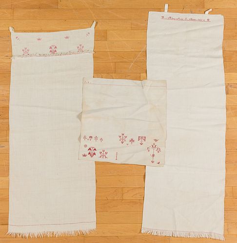 Three embroidered show towels