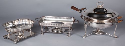 Three silver plated warming dishes.