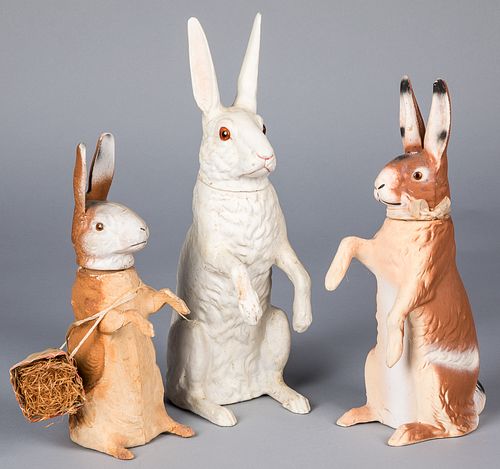 Three seated rabbit candy containers