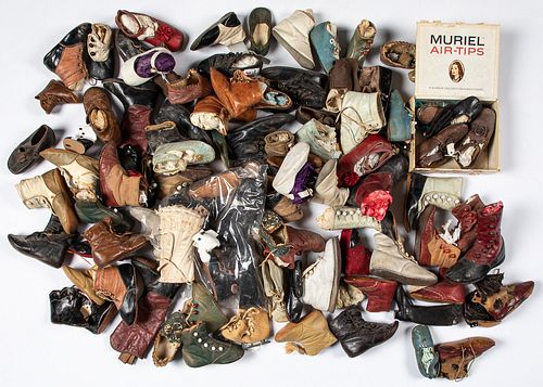 Collection of doll and children's shoes and boots