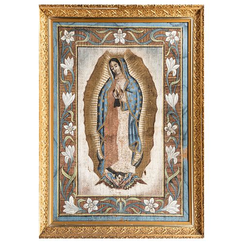 ANÓNIMO. Virgen de Guadalupe. Óleo sobre yute.  106 x 72 cm. Detalles de conservación en marco, perforaciones en lienzo. E...