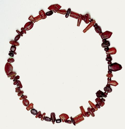 A Seljuk Era Red Amber Amulets Necklace, XI c.