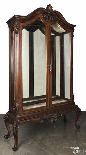 Carved mahogany display cabinet, early 20th c., 92'' h., 54'' w.