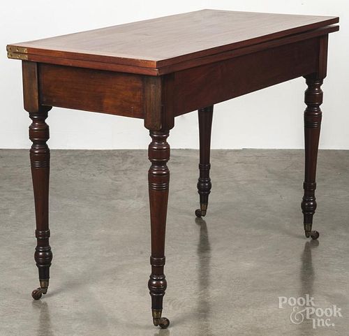 Regency mahogany games table, ca. 1820, 29 1/2'' h., 40'' w.